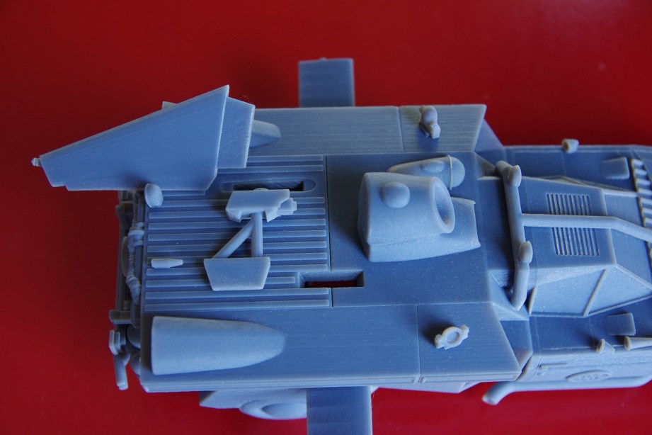 Protruding parts are printed separately - Objet print shown.