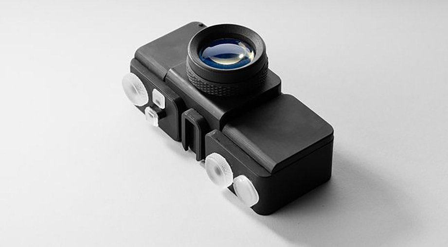 Polished 3D printed lens and camera - CREDIT: Amos Dudley