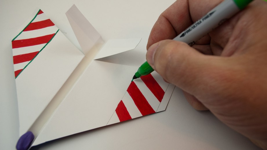Decorating your airplanes with markers is part of the fun…especially for kids.