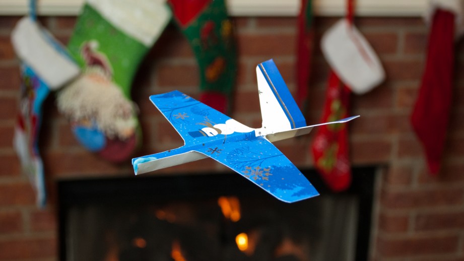A properly trimmed Christmas card airplane should easily cruise across your living room.